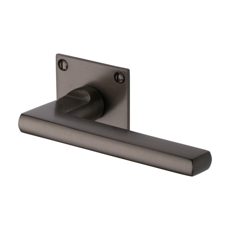 This is an image of a Heritage Brass - Door Handle Lever Latch on Square Rose Trident Design Matt Bronze finish, bau2910-mb that is available to order from Trade Door Handles in Kendal.