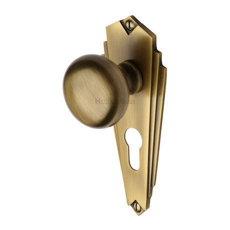 This is an image of a Heritage Brass - Mortice Knob on Euro Profile Plate Broadway Design Antique Brass F, br1848-at that is available to order from Trade Door Handles in Kendal.