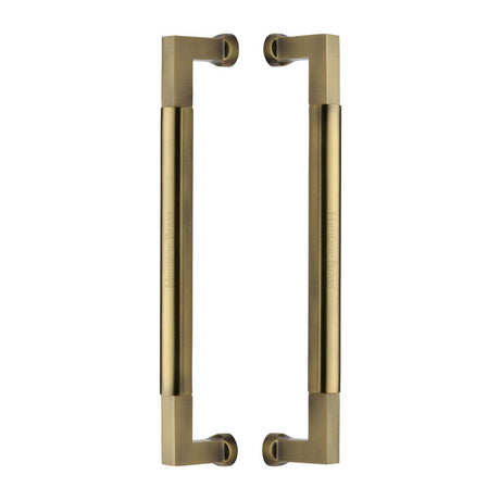 This is an image of a Heritage Brass - Door Pull Handle Bauhaus Design 330mm Antique Brass Finish, btb1312-330-at that is available to order from Trade Door Handles in Kendal.