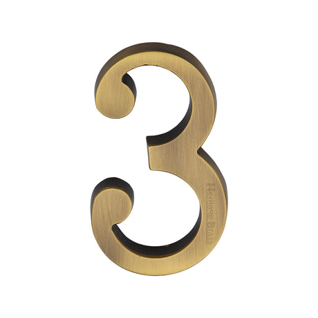 This is an image of a Heritage Brass - Numeral 3 Concealed Fix 76mm (3") Antique Brass finish, c1564-3-at that is available to order from Trade Door Handles in Kendal.