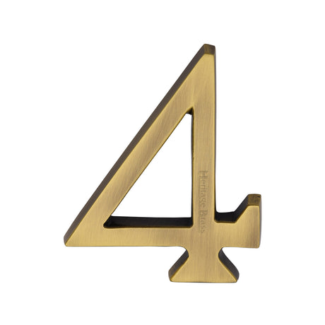 This is an image of a Heritage Brass - Numeral 4 Concealed Fix 76mm (3") Antique Brass finish, c1564-4-at that is available to order from Trade Door Handles in Kendal.