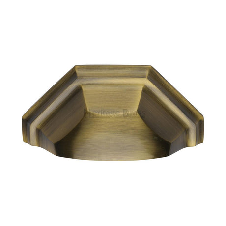 This is an image of a Heritage Brass - Drawer Cup Pull Deco Design 89mm CTC Antique Brass Finish, c2768-at that is available to order from Trade Door Handles in Kendal.