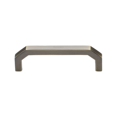 This is an image of a Heritage Brass - Cabinet Pull Hex Angular Design 101mm CTC Antique Brass Finish, c3465-101-at that is available to order from Trade Door Handles in Kendal.