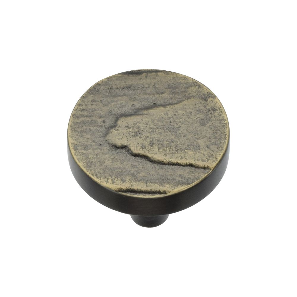 This is an image of a Heritage Brass - Cabinet Knob Round Pine Design 32mm Aged Brass Finish, c3697-32-ab that is available to order from Trade Door Handles in Kendal.