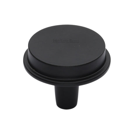 This is an image of a Heritage Brass - Flat Round Knob Design 38 mm Matt Black finish, c4592-38-bkmt that is available to order from Trade Door Handles in Kendal.