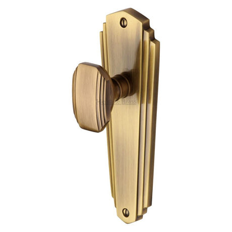 This is an image of a Heritage Brass - Mortice Knob on Latch Plate Charlston Design Antique Brass Finish, cha1910-at that is available to order from Trade Door Handles in Kendal.