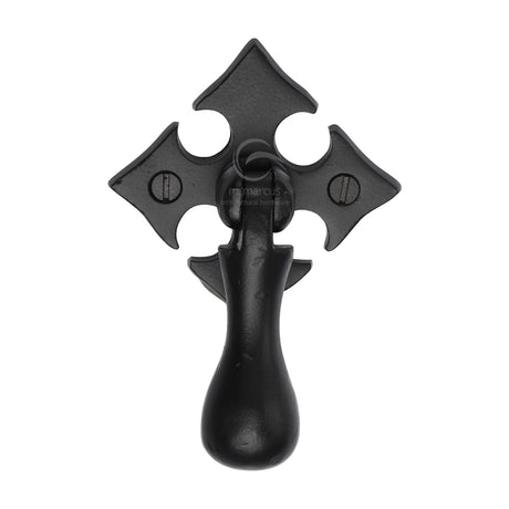 This is an image of a M.Marcus - Matt Black Rustic Iron Fleur-De-Lys Cabinet Drop Pull, fb6261 that is available to order from Trade Door Handles in Kendal.