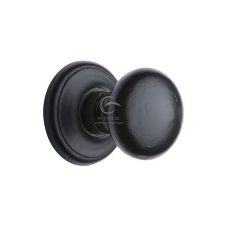 This is an image of a M.Marcus - Black Iron Rustic Round Centre Door Knob 3", fb901 that is available to order from Trade Door Handles in Kendal.
