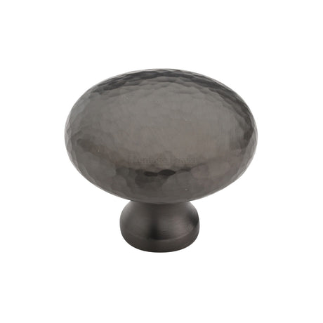 This is an image of a Heritage Brass - Cabinet Knob Victorian Round Hammered Design 38mm Matt Bronze finish, ham113-38-mb that is available to order from Trade Door Handles in Kendal.
