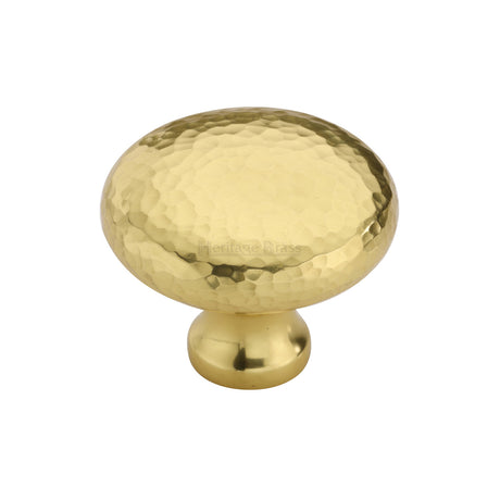 This is an image of a Heritage Brass - Cabinet Knob Victorian Round Hammered Design 38mm Polished Brass finish, ham113-38-pb that is available to order from Trade Door Handles in Kendal.