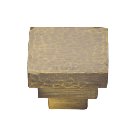 This is an image of a Heritage Brass - Cabinet Knob Square Stepped Hammered Design 32mm Antique Brass finish, ham3672-32-at that is available to order from Trade Door Handles in Kendal.