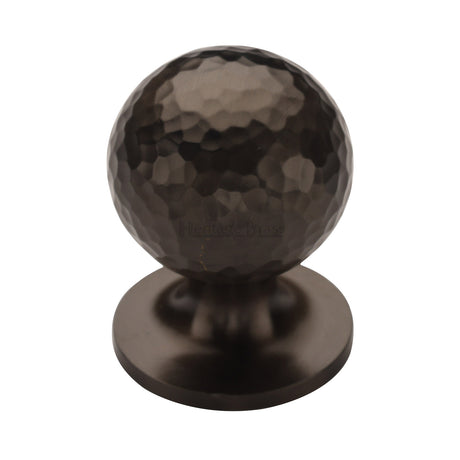 This is an image of a Heritage Brass - Cabinet Knob Ball Hammered Design 32mm Matt Bronze finish, ham8321-32-mb that is available to order from Trade Door Handles in Kendal.