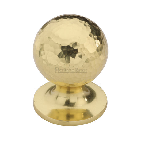 This is an image of a Heritage Brass - Cabinet Knob Ball Hammered Design 32mm Polished Brass finish, ham8321-32-pb that is available to order from Trade Door Handles in Kendal.