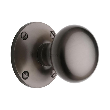 This is an image of a Heritage Brass - Mortice Knob on Rose Kensington Design Matt Bronze Finish, ken980-mb that is available to order from Trade Door Handles in Kendal.