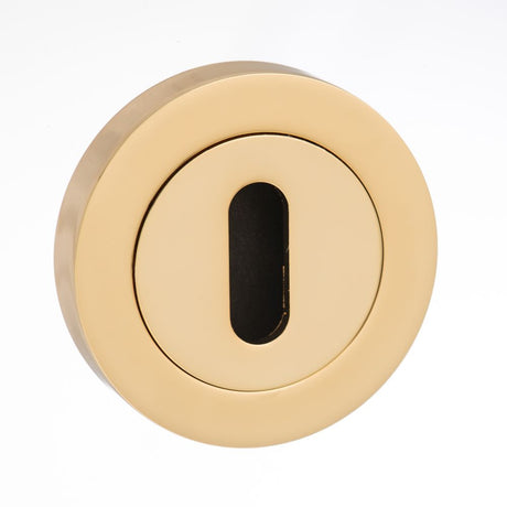 This is an image of Mediterranean Key Escutcheon on Round Rose - Polished Brass available to order from Trade Door Handles.