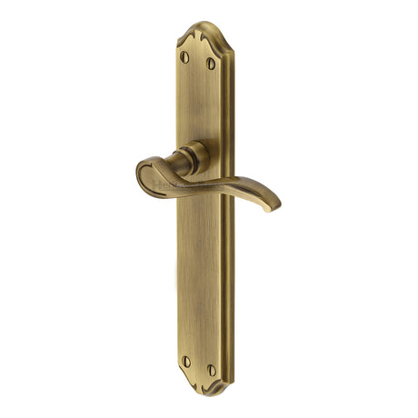 This is an image of a Heritage Brass - Door Handle Lever Latch Verona Long Design Antique Brass finish, mm827-at that is available to order from Trade Door Handles in Kendal.