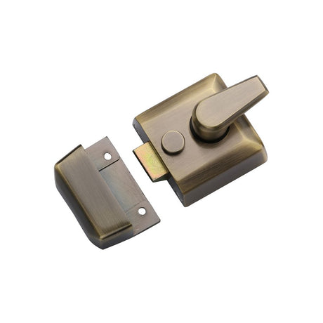 This is an image of a York - 40mm Std. Nightlatch Antique Brass Finish, nl3040-at that is available to order from Trade Door Handles in Kendal.
