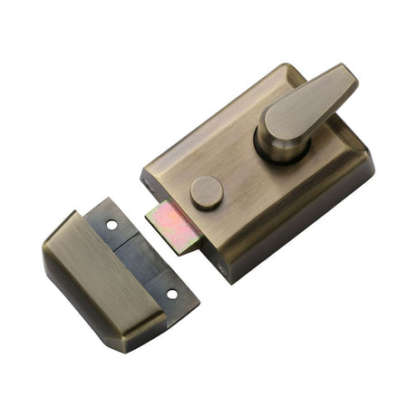 This is an image of a York - 60mm Std. Nightlatch Antique Brass Finish, nl3060-at that is available to order from Trade Door Handles in Kendal.