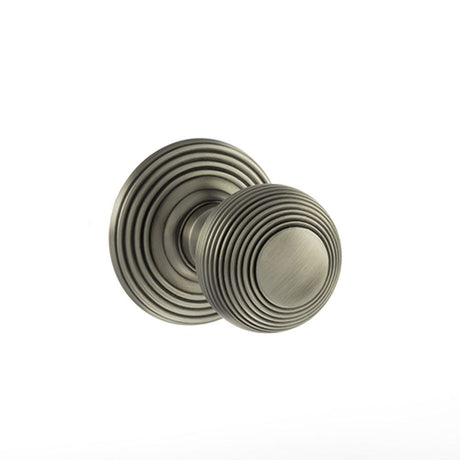This is an image of Old English Ripon Solid Brass Reeded Mortice Knob on Concealed Fix Rose - Matt G available to order from Trade Door Handles.