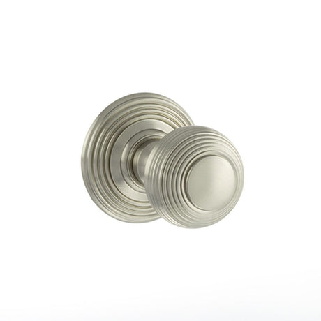This is an image of Old English Ripon Solid Brass Reeded Mortice Knob on Concealed Fix Rose - Satin available to order from Trade Door Handles.