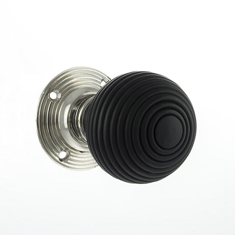 This is an image of Old English Whitby Ebony Wood Reeded Mortice Knob on 60mm Face Fix Rose - Polish available to order from Trade Door Handles.