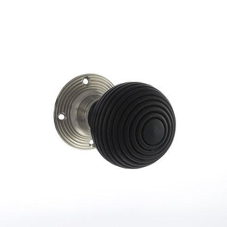 This is an image of Old English Whitby Ebony Wood Reeded Mortice Knob on 60mm Face Fix Rose - Satin available to order from Trade Door Handles.