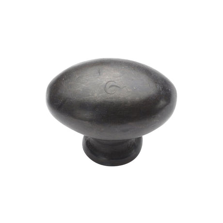 This is an image of a M.Marcus - Rustic Dark Bronze Cabinet Knob Oval Design 32mm, rdb118-32 that is available to order from Trade Door Handles in Kendal.