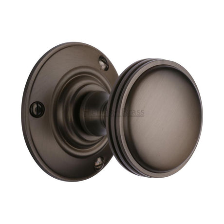 This is an image of a Heritage Brass - Mortice Knob on Rose Richmond Design Matt Bronze Finish, rhm988-mb that is available to order from Trade Door Handles in Kendal.