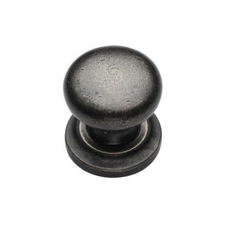This is an image of a M.Marcus - Rustic Pewter Cabinet Knob Round Design on Rose 25mm, rpw613-25 that is available to order from Trade Door Handles in Kendal.