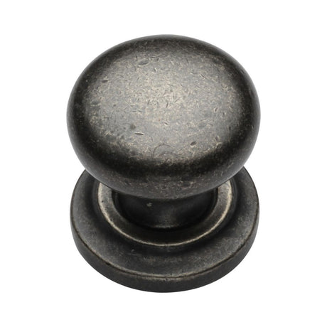 This is an image of a M.Marcus - Rustic Pewter Cabinet Knob Round Design on Rose 32mm, rpw613-32 that is available to order from Trade Door Handles in Kendal.