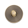 This is an image of a Heritage Brass - Reeded Bell Push Antique Brass finish, rr1186-at that is available to order from Trade Door Handles in Kendal.