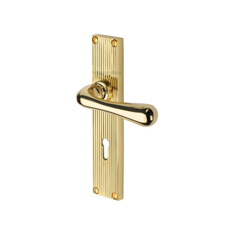 This is an image of a Heritage Brass - Charlbury Reeded Lever Lock Polished Brass finish, rr3000-pb that is available to order from Trade Door Handles in Kendal.
