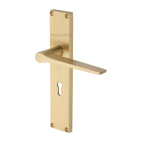 This is an image of a Heritage Brass - Gio Reeded Lever Lock Satin Brass finish, rr4700-sb that is available to order from Trade Door Handles in Kendal.