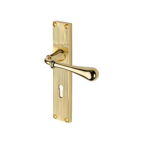 This is an image of a Heritage Brass - Roma Reeded Lever Lock Polished Brass finish, rr6000-pb that is available to order from Trade Door Handles in Kendal.