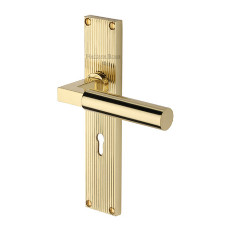 This is an image of a Heritage Brass - Bauhaus Reeded Lever Lock Polished Brass finish, rr7300-pb that is available to order from Trade Door Handles in Kendal.