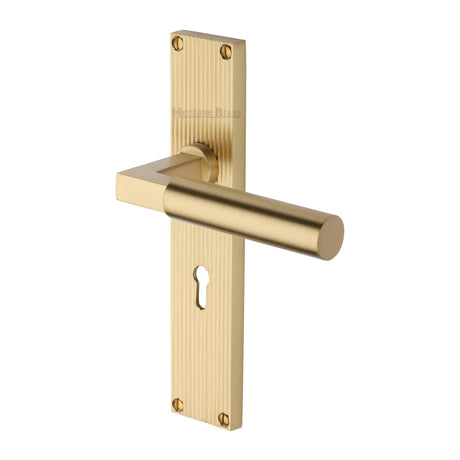 This is an image of a Heritage Brass - Bauhaus Reeded Lever Lock Satin Brass finish, rr7300-sb that is available to order from Trade Door Handles in Kendal.