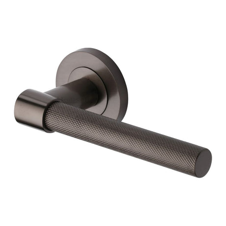 This is an image of a Heritage Brass - Door Handle Lever on Rose Phoenix Knurled Design Matt Bronze Fi, rs2018-mb that is available to order from Trade Door Handles in Kendal.