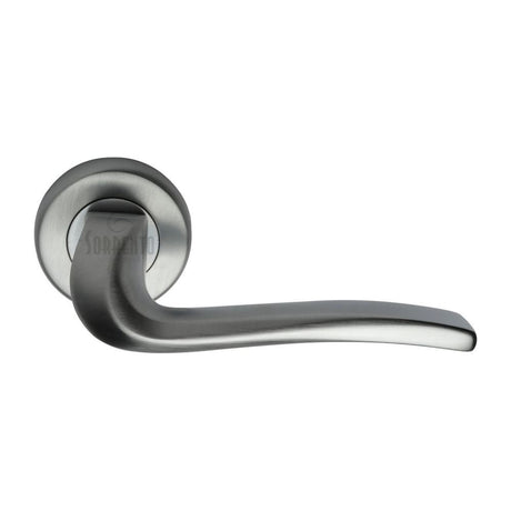 This is an image of a Sorrento - Door Handle Lever Latch on Round Rose Capri Design Satin Chrome Finish, sc-4262-sc that is available to order from Trade Door Handles in Kendal.