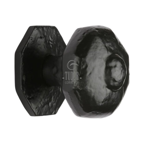 This is an image of a The Tudor Collection - Octagon Centre Door Knob Black Iron, tc350 that is available to order from Trade Door Handles in Kendal.