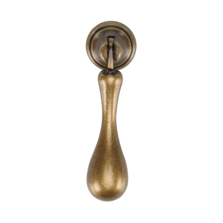 This is an image of a M.Marcus - Classic Drop Pull 053mm Distressed Brass Finish, tk1396-053-dbs that is available to order from Trade Door Handles in Kendal.