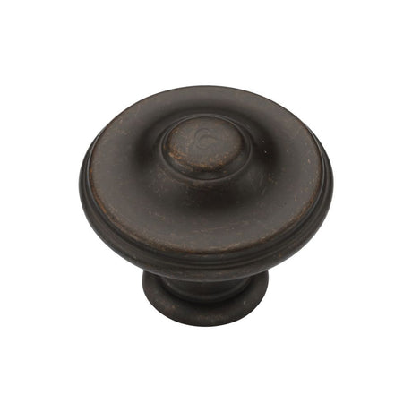 This is an image of a M.Marcus - Domed Round Knob 035mm Matt Bronze Finish, tk4408-035-lbn that is available to order from Trade Door Handles in Kendal.