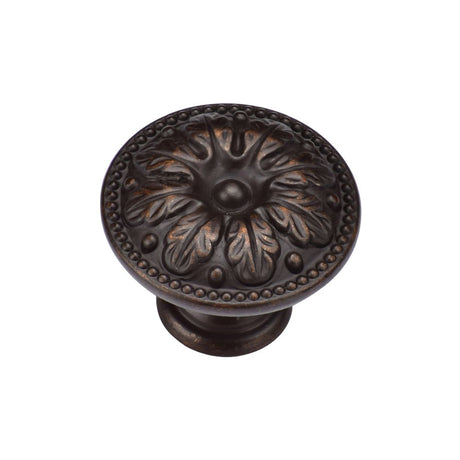 This is an image of a M.Marcus - Floral Round Knob 030mm Matt Bronze Finish, tk4479-030-lbn that is available to order from Trade Door Handles in Kendal.