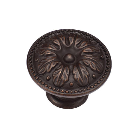 This is an image of a M.Marcus - Floral Round Knob 035mm Matt Bronze Finish, tk4479-035-lbn that is available to order from Trade Door Handles in Kendal.