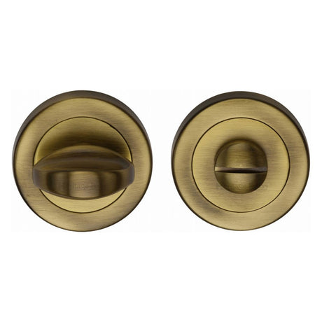 This is an image of a Heritage Brass - Thumbturn & Emergency Release Antique Brass Finish, v0678-at that is available to order from Trade Door Handles in Kendal.