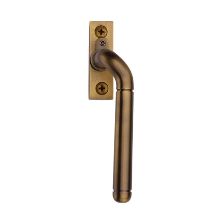 This is an image of a Heritage Brass - Lockable Espagnolette Right Handed Antique Brass finish, v1006l-rh-at that is available to order from Trade Door Handles in Kendal.