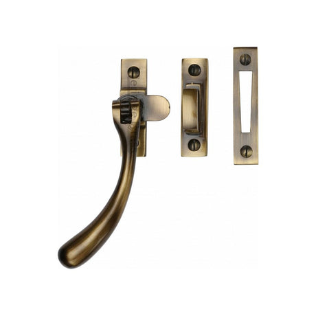 This is an image of a Heritage Brass - Casement Window Fastener Ball Design Antique Brass Finish, v1008-mp-hp-at that is available to order from Trade Door Handles in Kendal.