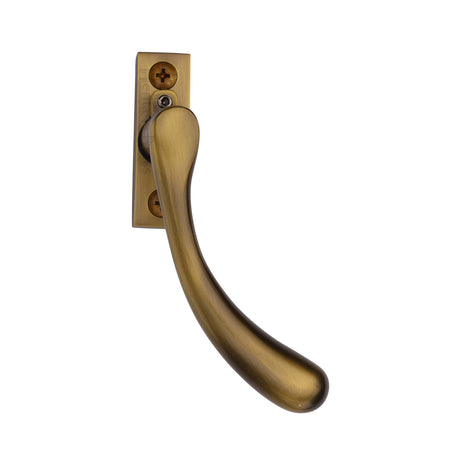 This is an image of a Heritage Brass - Right-Handed Espagnolette Handle Ball Design Antique Brass finish, v1009l-rh-at that is available to order from Trade Door Handles in Kendal.