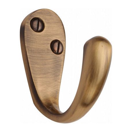 This is an image of a Heritage Brass - Single Robe Hook Antique Brass Finish, v1040-at that is available to order from Trade Door Handles in Kendal.