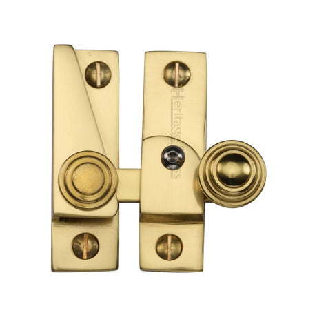This is an image of a Heritage Brass - Sash Fastener Lockable Unlacquered Brass Finish, v1104l-ulb that is available to order from Trade Door Handles in Kendal.