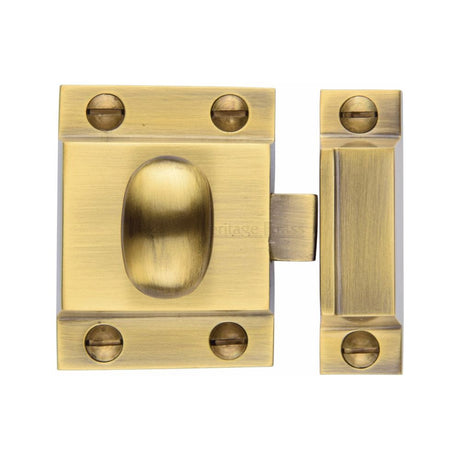 This is an image of a Heritage Brass - Cupboard Latch with Oval Turn Antique Brass Finish, v1112-at that is available to order from Trade Door Handles in Kendal.